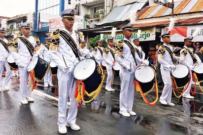 Panoramic view of people standing on street