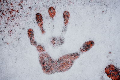 High angle view of text on snow