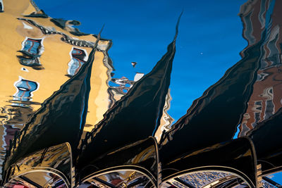 Low angle view of traditional building against blue sky