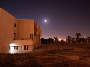 Built structure against clear sky at night