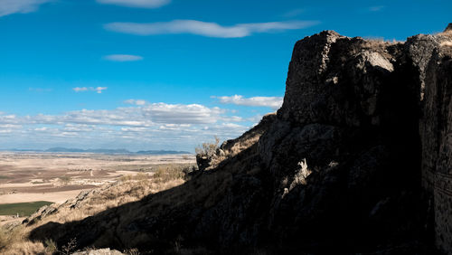 Scenic view of rock formation against sky