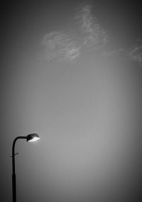 Low angle view of street light against sky