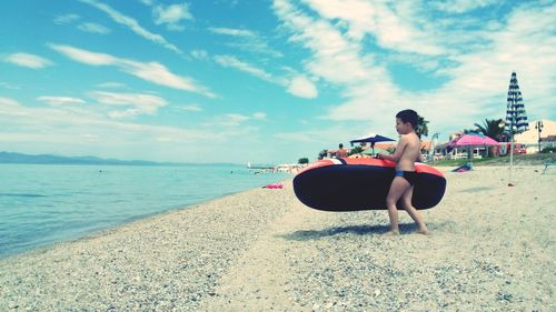 Woman standing on beach