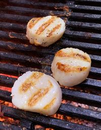 High angle view of bread on barbecue grill