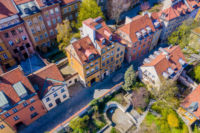 Old town square with historic street town architecture and windows multicolored pattern of pink 