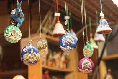 Close-up of decoration hanging for sale in market