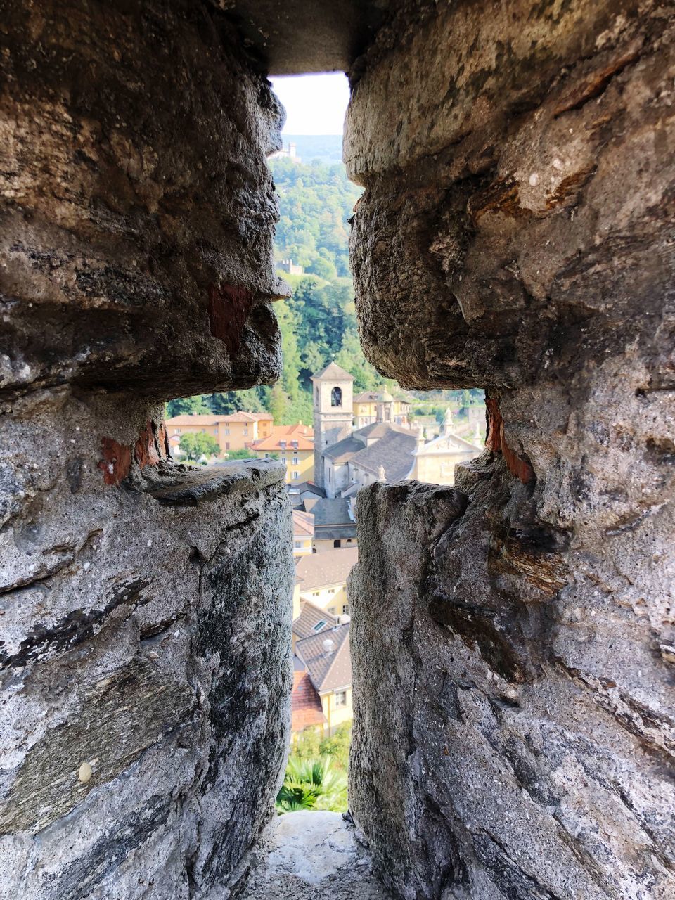 REAR VIEW OF ROCK FORMATIONS IN A WALL