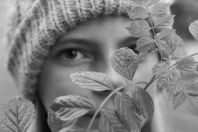 Close-up of woman wearing knit hat