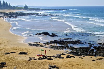 Scenic view of beach against sky
