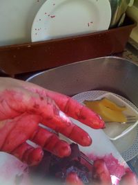 Midsection of man in kitchen
