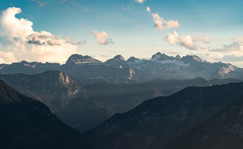 Scenic view of snowcapped mountains against sky