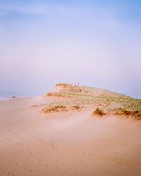 Scenic view of desert against sky