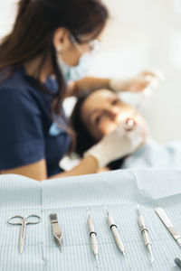 Close-up of dental equipment on table in hospital