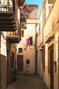 Narrow alley amidst residential buildings