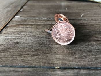 Close-up of coins on table