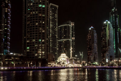 Illuminated city lit up at night