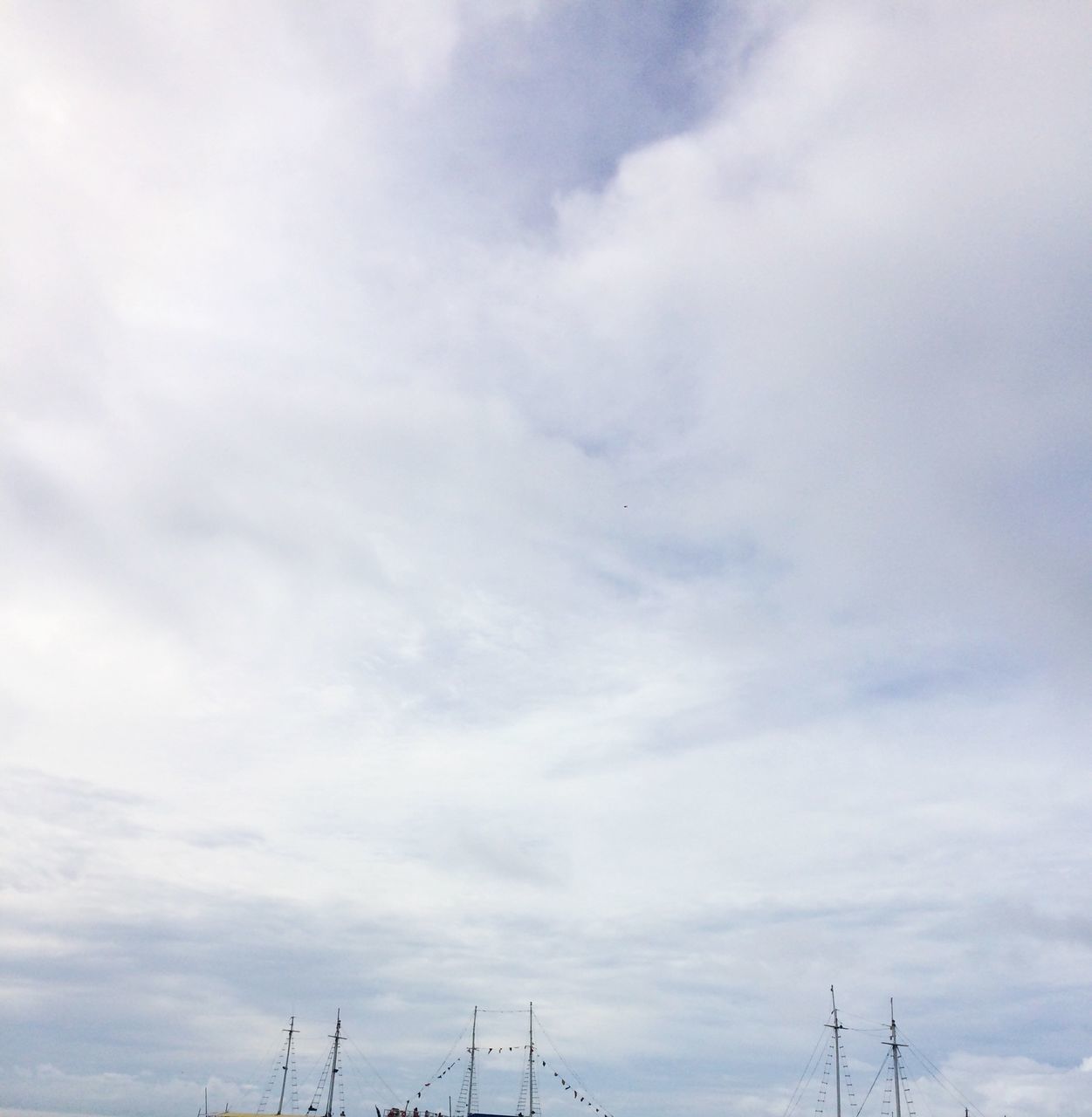 cloud - sky, sky, technology, nature, low angle view, connection, no people, day, outdoors, beauty in nature, electricity, electricity pylon, communication, scenics - nature, cable, overcast, high section, fuel and power generation, power line, power supply, global communications