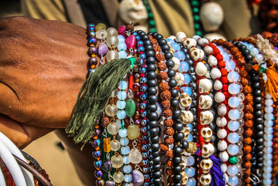 Close-up of multi colored jewelry for sale