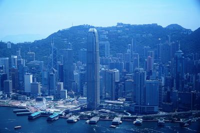 High angle view of modern buildings in city against sky