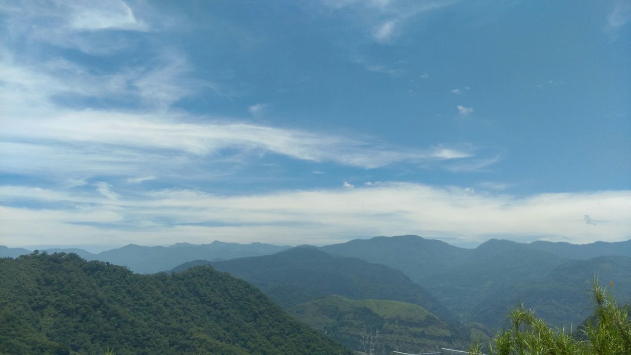 mountain, tranquil scene, scenics, tranquility, mountain range, beauty in nature, sky, tree, landscape, nature, cloud - sky, non-urban scene, idyllic, cloud, blue, day, remote, outdoors, no people, non urban scene