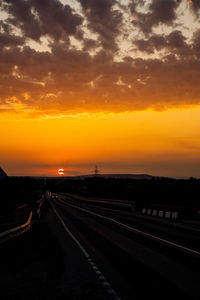 Road against sky during sunset