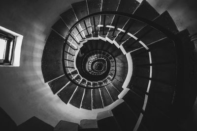 Directly below shot of spiral staircase in building