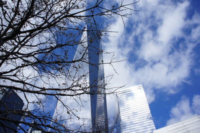 Low angle view of bare tree against sky