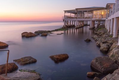 Scenic view of sea against sky at sunset