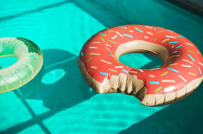 Close-up of inflatable ring floating in swimming pool