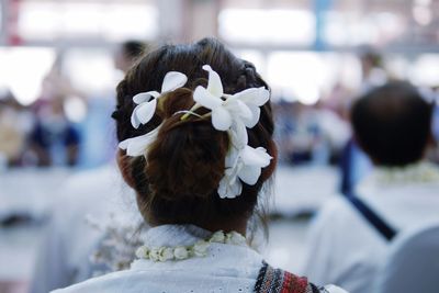 Rear view of woman with umbrella