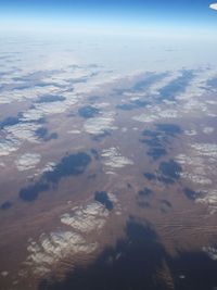 Aerial view of landscape against sky during sunset