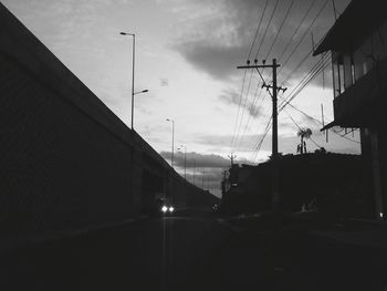 Street light against sky