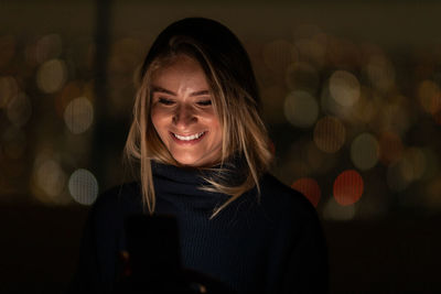 Portrait of young woman looking away