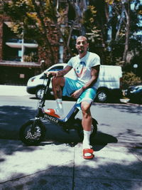 Portrait of smiling man riding motorcycle