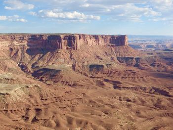 Scenic view of rock formations against sky