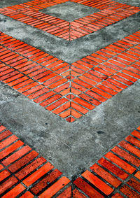 Full frame shot of red brick abstract pattern in the street