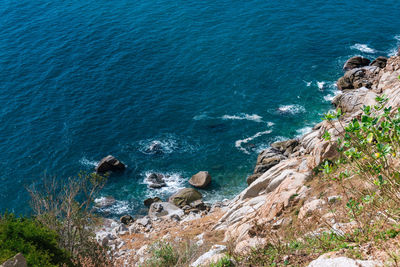 High angle view of rocks on beach