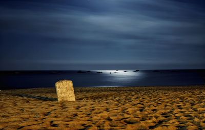 Scenic view of sea against sky at dusk