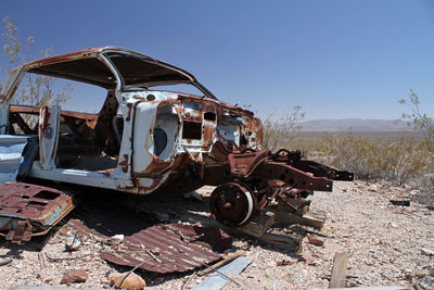 Wrecked car in death valley