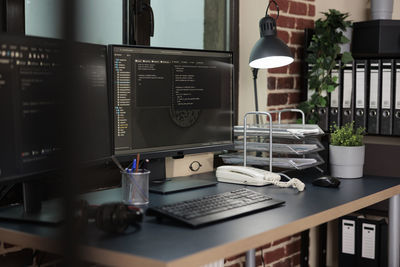 Close-up of computer on table