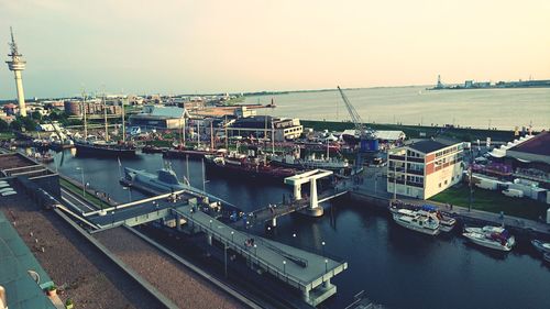 High angle view of boats moored in sea against clear sky