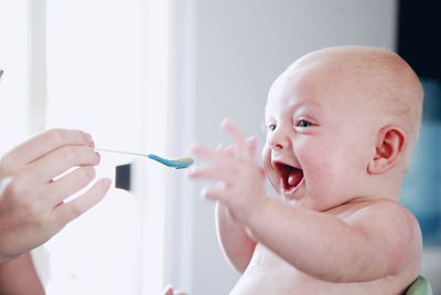 Close-up of cute baby eating