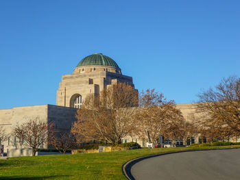 View of castle against clear blue sky