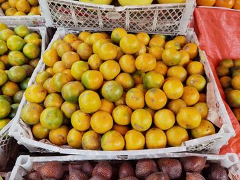 High angle view of fruits for sale at market stall