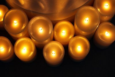 High angle view of illuminated candles