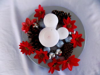 High angle view of flowers in plate on table