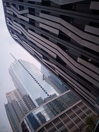 Low angle view of modern buildings against sky