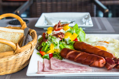 Close-up of breakfast served on table