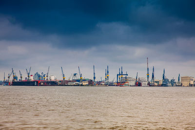 Pier over sea against sky