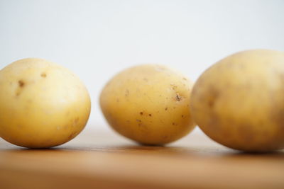 Close-up of oranges on table